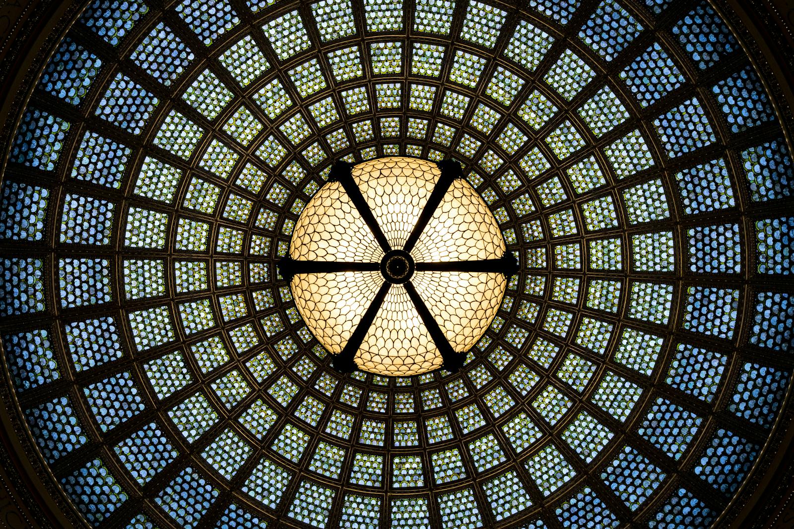 A mesmerizing view of the Tiffany stained glass dome at Chicago Cultural Center.
