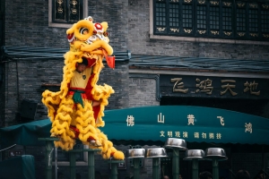 A colorful lion dance performed during a traditional Chinese festival.