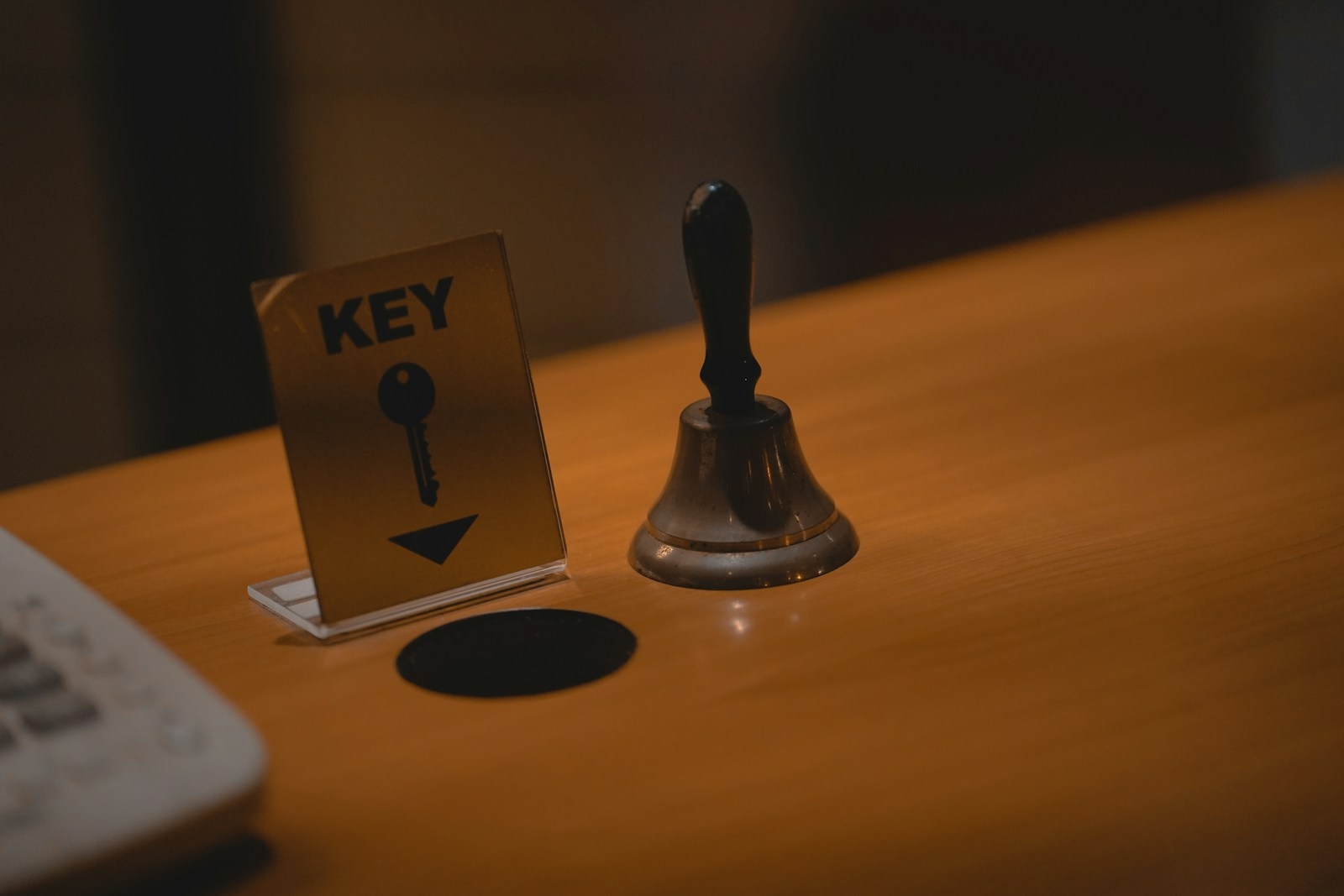 brown hand bell