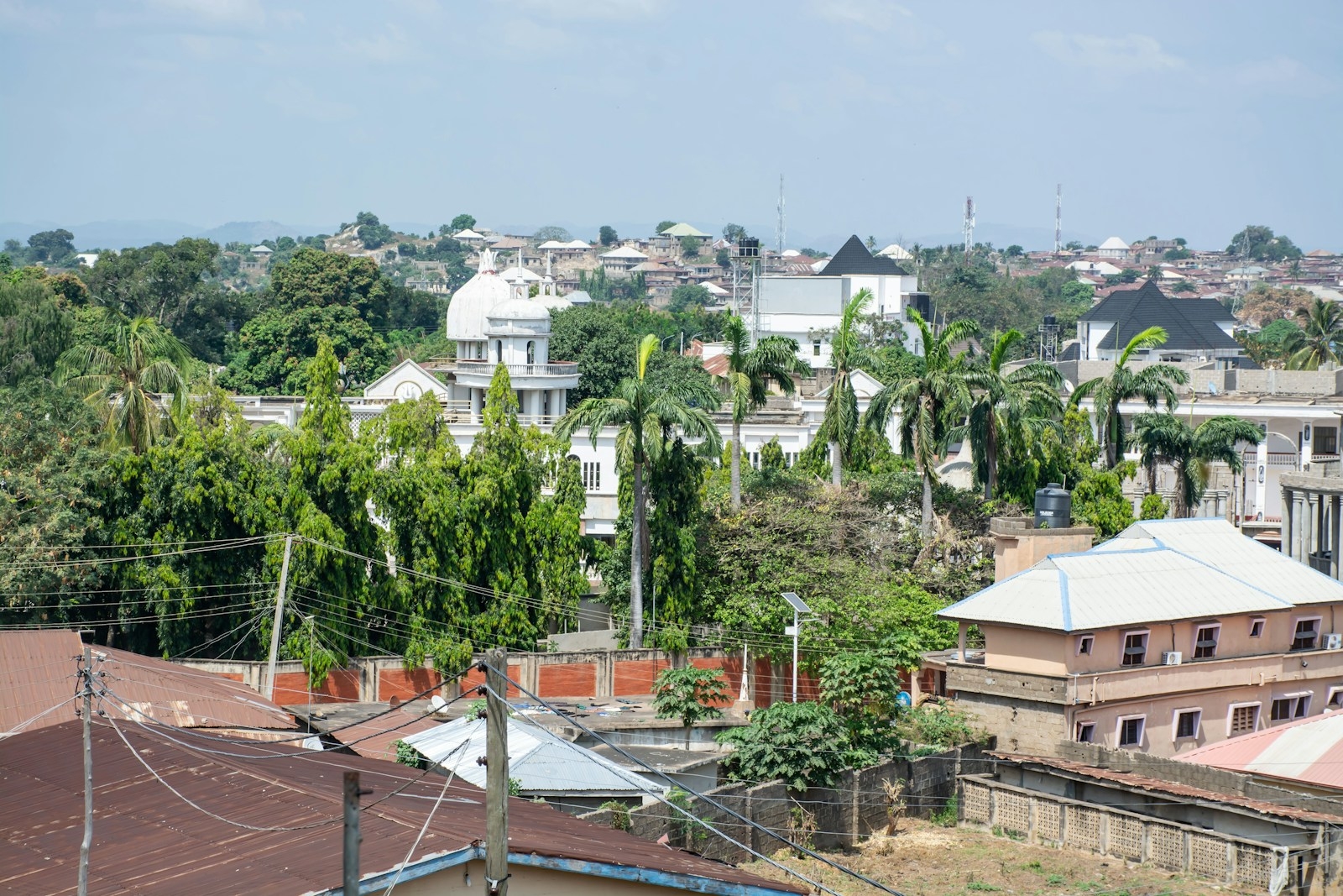a city with lots of houses and trees