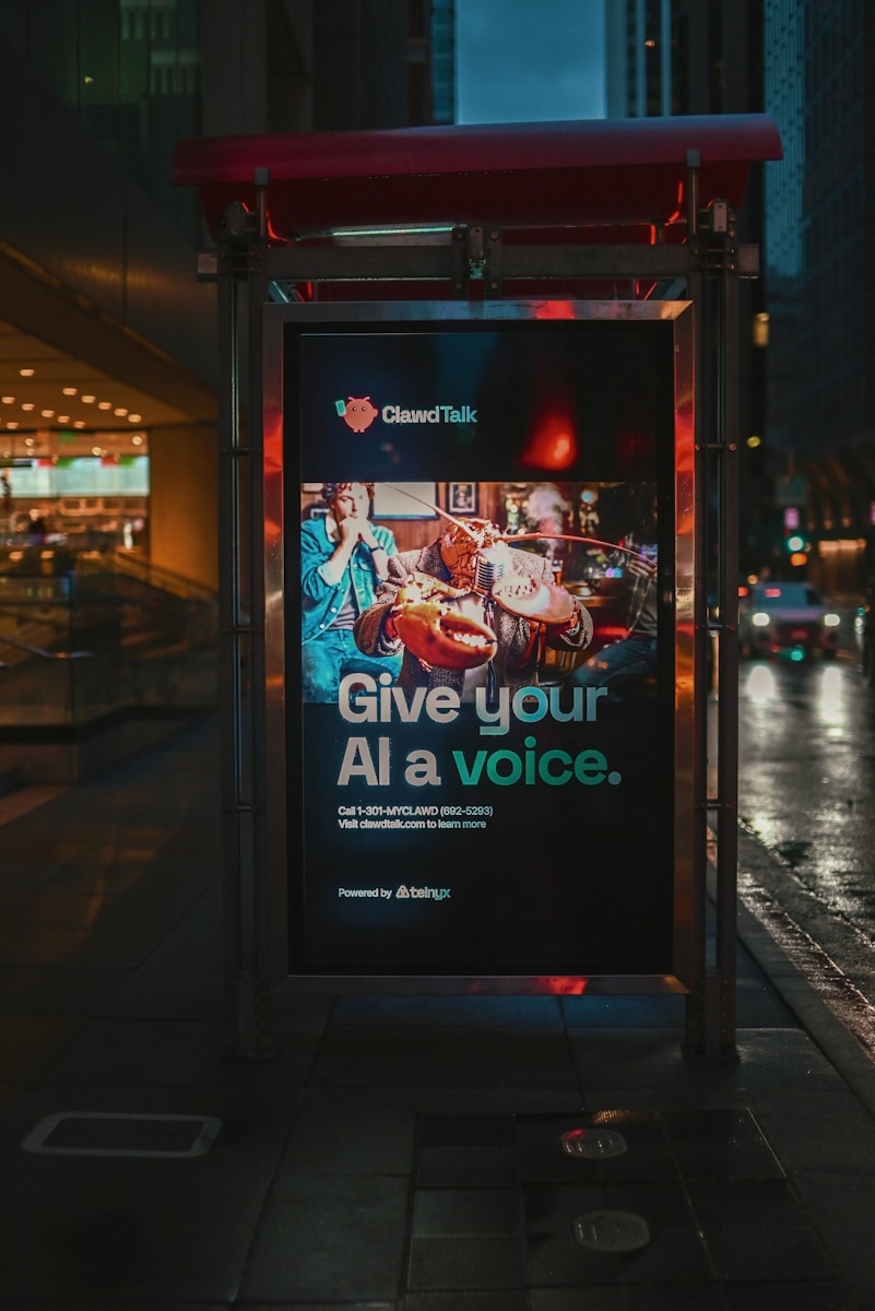 Digital advertisement for "choosetalk" at a bus stop.