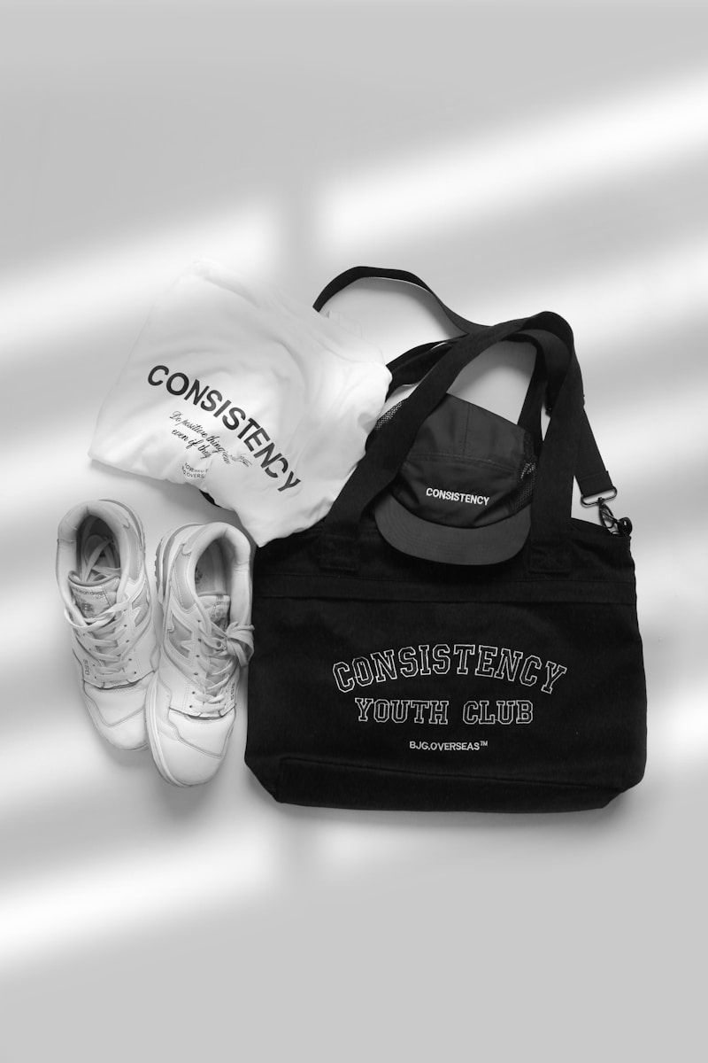 A pair of shoes and a tote bag sitting next to each other