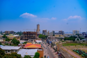 City skyline with buildings and a stadium